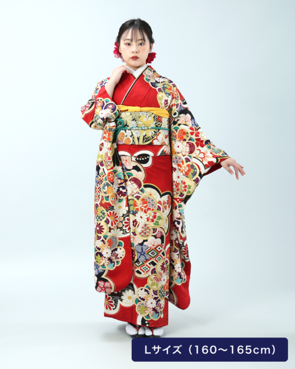 赤地に鮮やかな色使いの花丸文